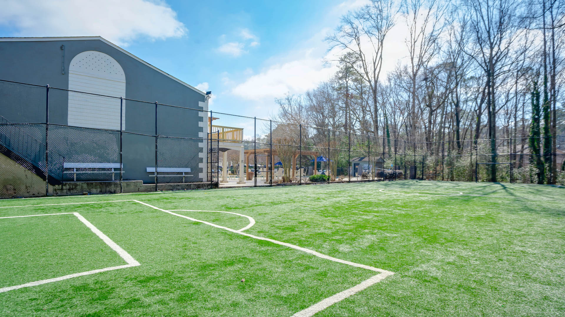 Astroturf soccer field and pool